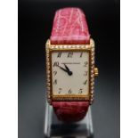 A Vintage 18K Gold and Diamond Audemars Piguet Ladies Watch. Pink crocodile strap with gold