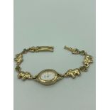 SILVER ELEPHANT bracelet with Quartz wristwatch Having a Lenox ladies wristwatch with elephant and