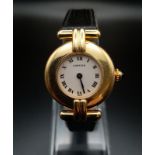 A Cartier 18K Gold Colisee Ladies Quartz Watch. Black leather strap with 18k gold case - 23mm. White
