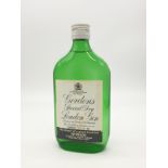 A 13 AND A 1/3 FLUID OZ BOTTLE OF GORDONS GIN FROM 1972, DISCONTINUED SIZE BOTTLE