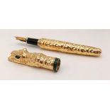 A heavy, luxuriously 18 K yellow gold plated fountain pen in the style of Cartier Panther. In a