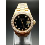 An 18K Solid Gold and Diamond Ladies Rolex Oyster Perpetual Datejust. 18K gold strap and case -