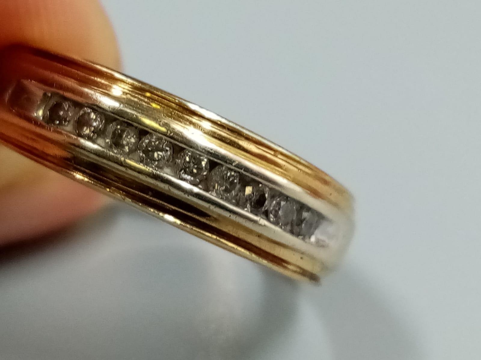 A 9 K yellow gold ring with band of diamonds. Ring size: T, weight: 5.3 g. - Image 3 of 7