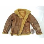 An Original WW2 Era Sheep-Skin Irvin RAF Flying Jacket - 40/42 inch chest. It has a heavily worn