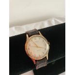 Vintage 1950's Gentlemans Ingersoll wristwatch, manual winding in full working order having gold