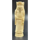 A 19th Century carved ivory of a Japanese figure (signed) with a sword. Height: 14.3 cm, weight: 127