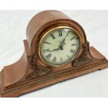 A modern copy of an antique copper over mantle clock marked London Clock Company. Dimensions: 40 x