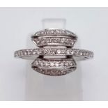 An 18 K white gold ring with five rows of diamonds. Ring size: N, weight: 3.7 g.
