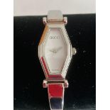 Ladies Quartz wristwatch in silver tone having white face and sweeping second hand. Full working