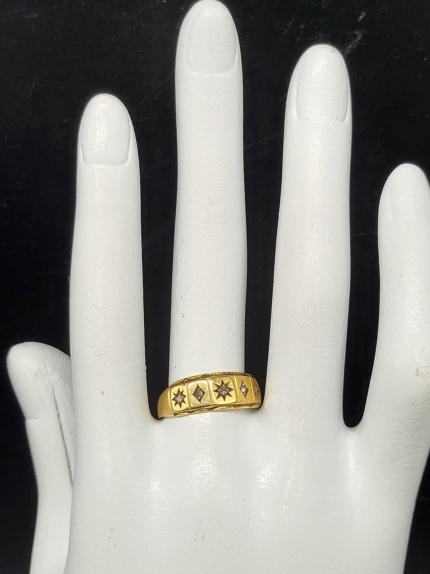 A 15 K yellow gold ring with five diamonds on top. Ring size: Q, weight: 1.9 g. - Image 6 of 6