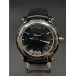 A Chopard Limited Edition Happy Sport Ceramic and Diamond Unisex Quartz Watch. Black rubber strap