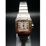 A Cartier Santos Quartz Ladies Watch. Stainless steel with gold strap and case - 25 x 25mm. White