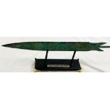 An Archaic Mesopotamian sword blade. Late bronze age (1200-800 B.C.) on a custom made, wooden