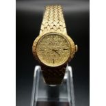 A Rolex 14k Solid Gold Automatic Ladies Watch. Gold strap and case - 27mm. Gold dial. 46g total