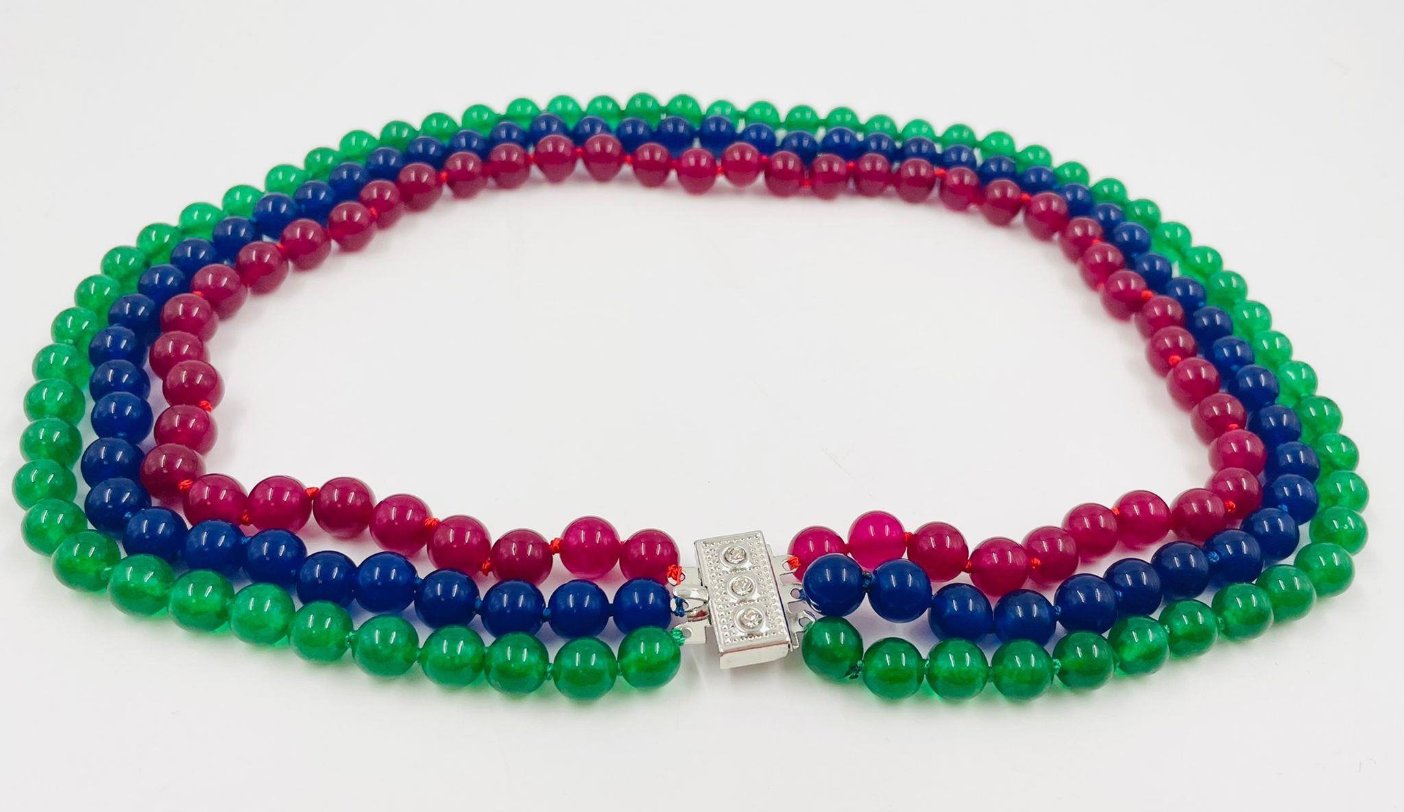 A Sensational 600ct Natural Emerald, Ruby and Sapphire Three-Row Smooth-Bead Necklace. Silver- - Image 2 of 3