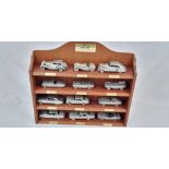 A DELIGHTFUL COLLECTION OF JAGUAR CAR MODELS FROM THE 1930'S THROUGH TO THE 80'S . MADE IN DIE