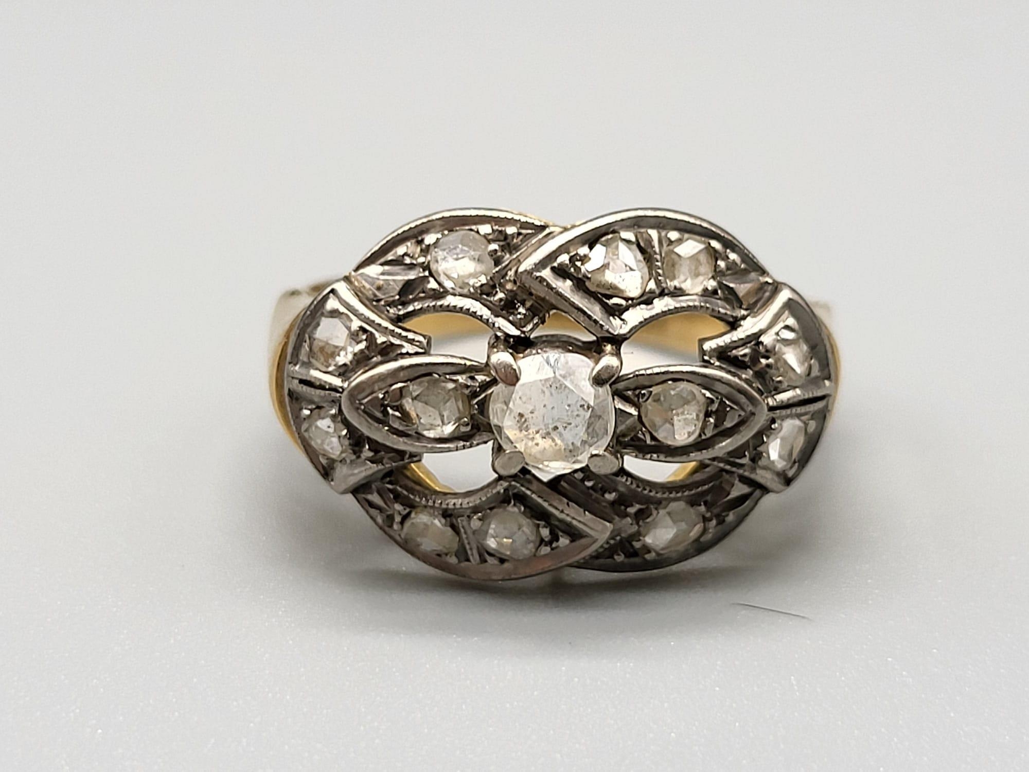 An Art Deco 18 K yellow gold ring with Diamonds. Ring size: M/N, weight: 4.4 g.