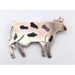 An Early Silver and Enamel Cow Pendant. 5 x 3.5cm. 10g