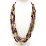 A five strand necklace with faceted precious and semiprecious stones. Length: 54-62 cm, total