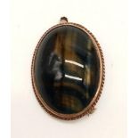 A Vintage 9K Yellow Gold Tigers Eye Brooch. 4cm. 13g total weight.