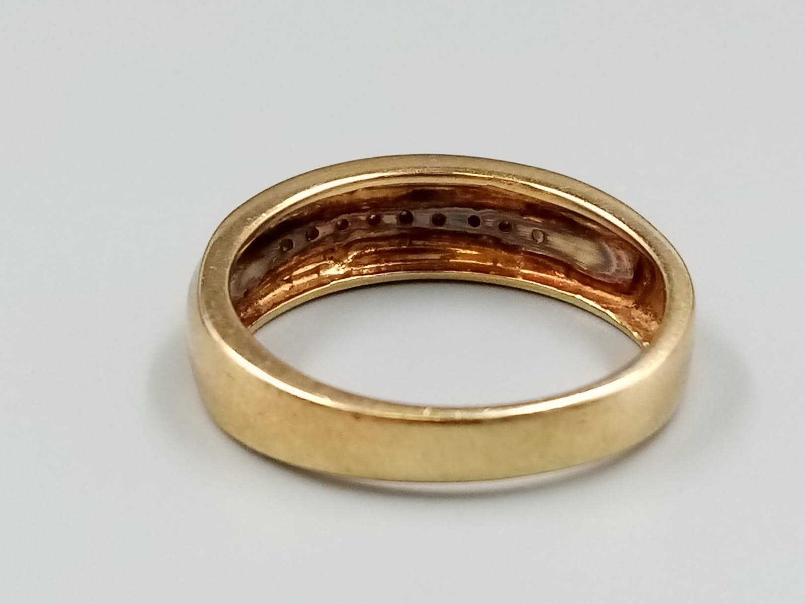 A 9 K yellow gold ring with band of diamonds. Ring size: T, weight: 5.3 g. - Image 4 of 7