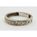 A 9K White Gold Diamond Half Eternity Ring. 0.25ct Size O. 3.1g