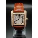 A Cartier 18K Gold and Diamond Ladies Automatic Tank Watch. Brown crocodile skin strap with an 18K