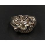 A 14K White Gold Abstract Floral Diamond Ring - Centre pistil diamond with petals and half-moon