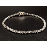 An 18K White Gold Diamond Tennis Bracelet. 2.3-2.5ct. I - VS Grade. 8.31g. 18cm.