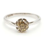 An 18K White Gold and Yellow Diamond Ring. 0.50ct. I1 - Grade. Size N. 2.37g.