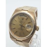 ROLEX OYSTER QUARTZ DAY-DATE 18K GOLD WATCH, GOLD TONE FACE AND SOLID GOLD STRAP. 36MM