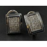 A Pair of 14K White Gold and Diamond Clip Earrings. 0.80ct. H-VS Grade. 5g.