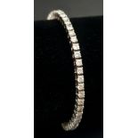 An 18K White Gold Diamond Set Tennis Bracelet. 3ct. 9.3g. 17cm.
