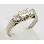 An 18k White Gold Three Diamond Ring. 0.55ct. Size L. 4.5g.