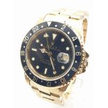 ROLEX GMT MASTER IN 18K GOLD WITH BLACK BEZEL AND FACE 40mm