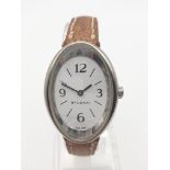 AN OVAL SHAPED BULGARI LADIES WATCH ON LEATHER STRAP. 32 X 24mm