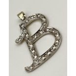 An 18K White Gold (tested) and Diamond Letter B Pendant. 3.25g. 35mm.