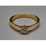 An 18K Yellow Gold Diamond Solitaire Ring. 0.30ct. Size N. 3.4g.