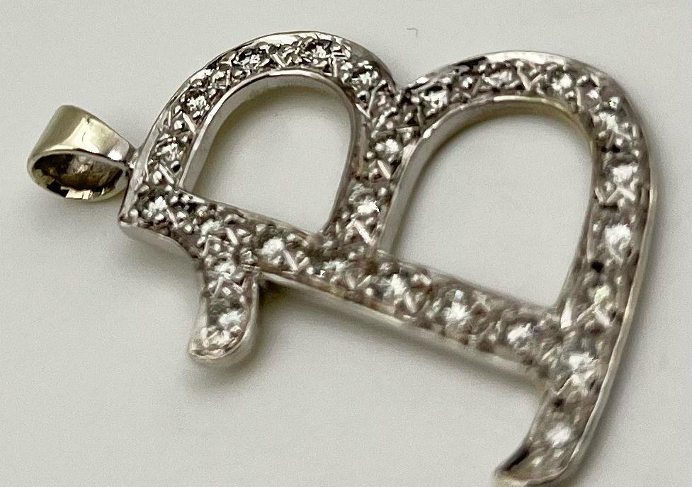 An 18K White Gold (tested) and Diamond Letter B Pendant. 3.25g. 35mm. - Image 3 of 3