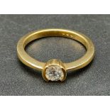 An 18K Yellow Gold Diamond Solitaire Ring. 0.30ct. Size M1/2. 3.3g.