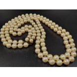 A Two-Row Golden South Sea Natural Pearl Necklace - With a Silver, Pearl and Diamond clasp. Pearl
