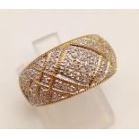 An 18K Yellow Gold Diamond Band Ring. 0.50ct. Size N. 5.6g.