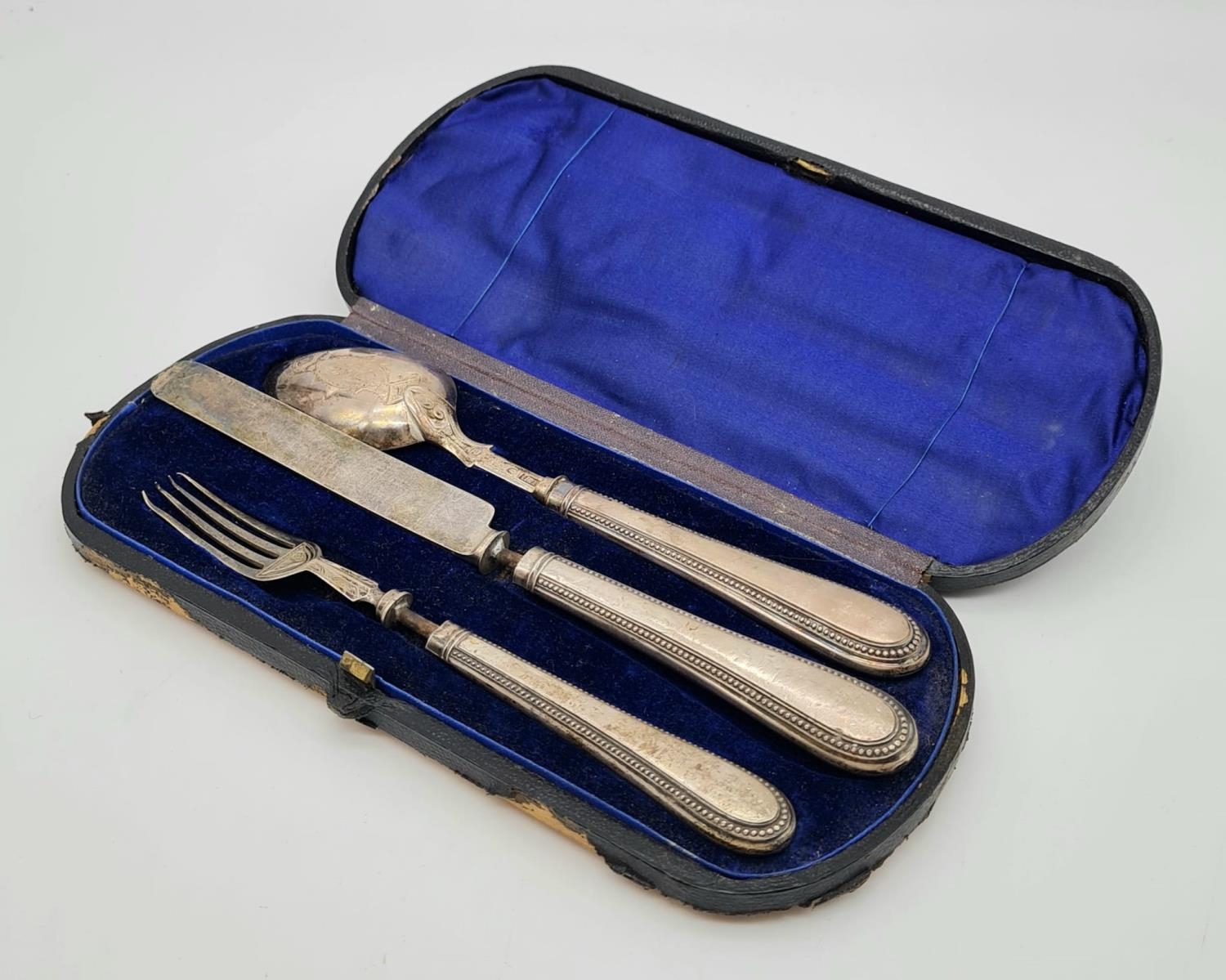 An Antique (mid 19th century) Knife, Fork and Spoon Set. Makers mark for Hilliard and Thomson of