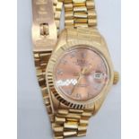 18ct gold Rolex oyster perpetual Datejust ladies watch with rose gold face and Roman numerals,