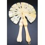 An Antique Chinese Ivory Hand-Fan. Very good condition with loop at top, for chain hanging, perhaps.