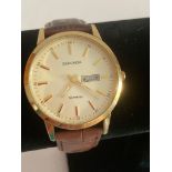 Gentlemans SEKONDA Quartz wristwatch in gold tone having an extremely large face with date window