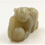 An Antique Chinese Jade Figurine of Buddha Holding a Ball. 7 x 4.5cm. Very good condition.