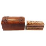 Two wooden casket shaped boxes. One hand carved, tropical wood, dimensions: 17 x 11 x 10 cm, the