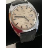 Vintage Gentlemans automatic Timex wristwatch in silver tone with black sweeping second hand and
