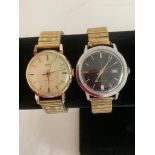 Two vintage Gentlemans wristwatches with expandable bracelets.Working intermittently in stop-start